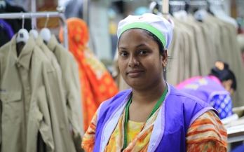 Garments worker smiling to the camera