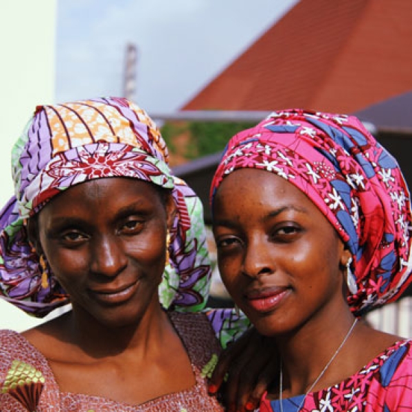 Two nigerian women posing for photo