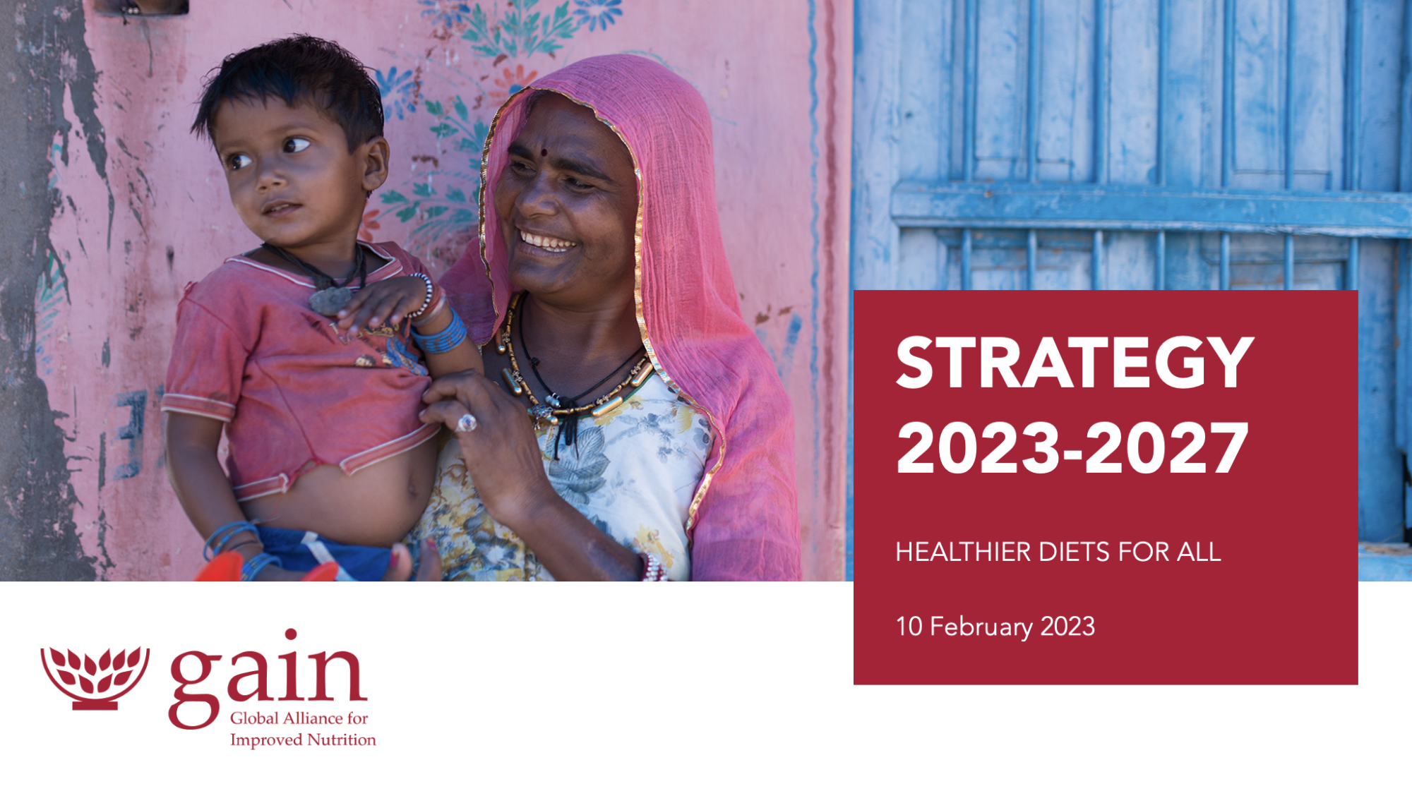 A woman in a pink veil smiles at her child, a blue due is behind them with the text "Strategy 2023-2027" and the GAIN logo