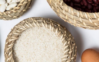 Baskets with rice, beans and one egg