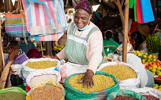 Kenyan food vendor with grain